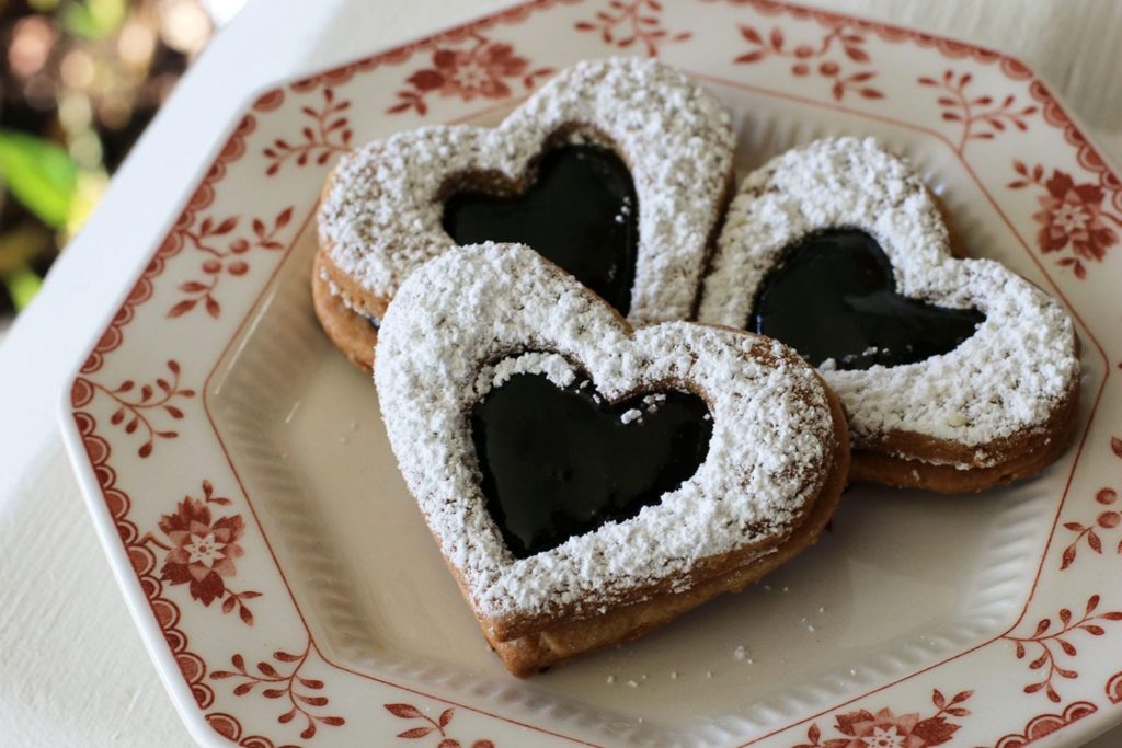 Linzer Heart Cookies on a china plate